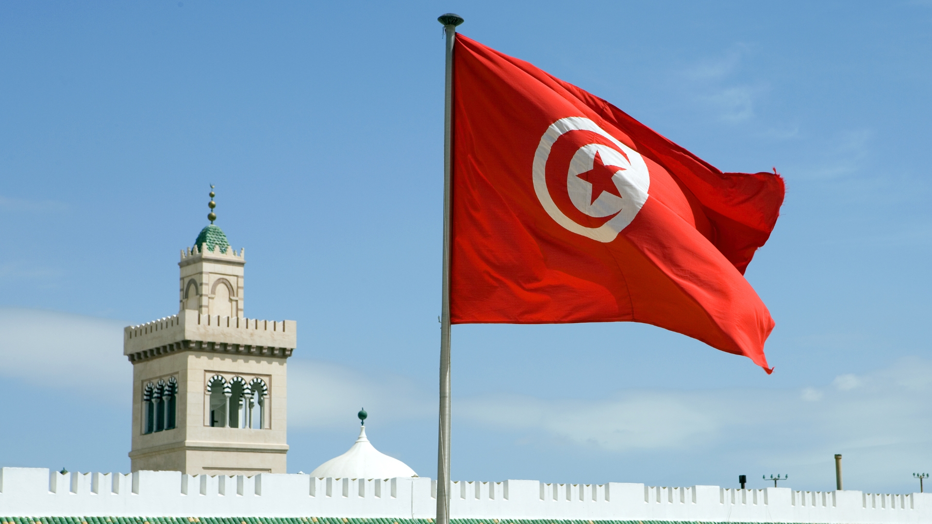 The flag of Tunisia on the top of La Kasbah Monument